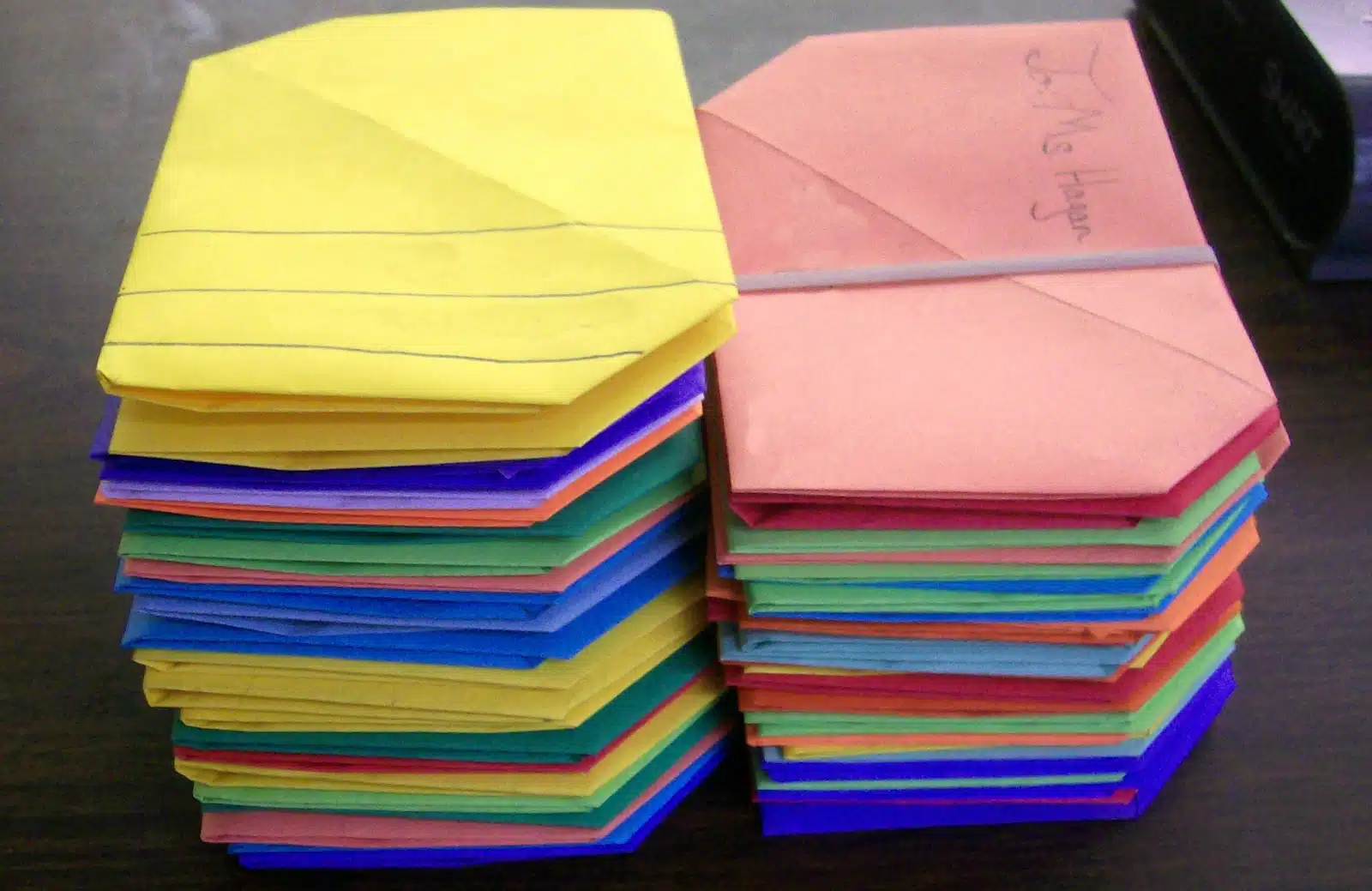 stack of origami letter envelopes. 