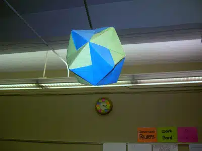 sonobe unit origami octahedron hanging from ceiling in math classroom. 