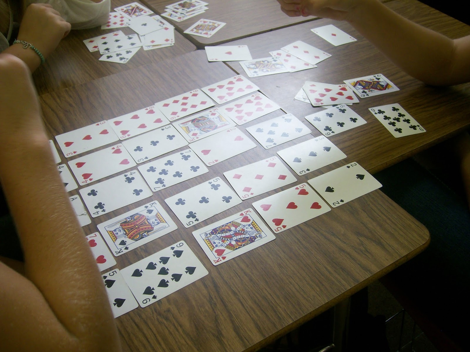 Students working on 31-derful playing card puzzle. 