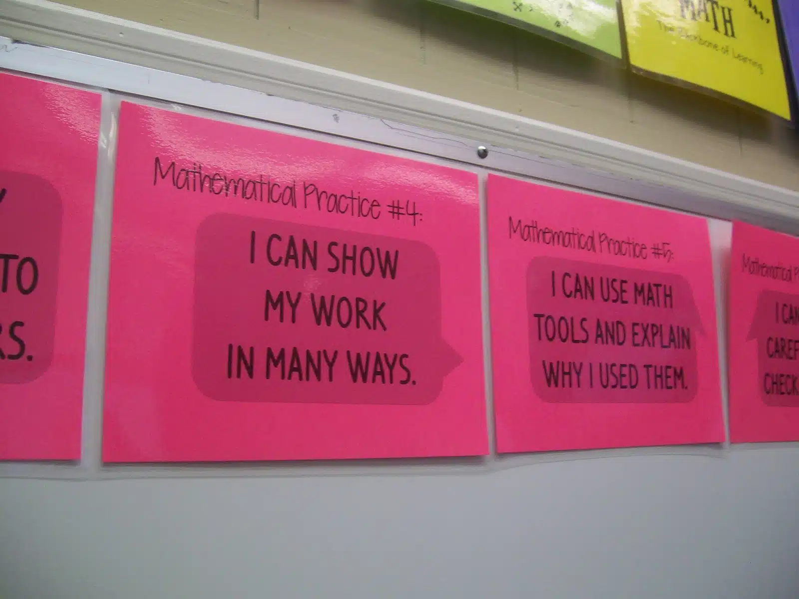 mathematical practice posters in high school math classroom. 