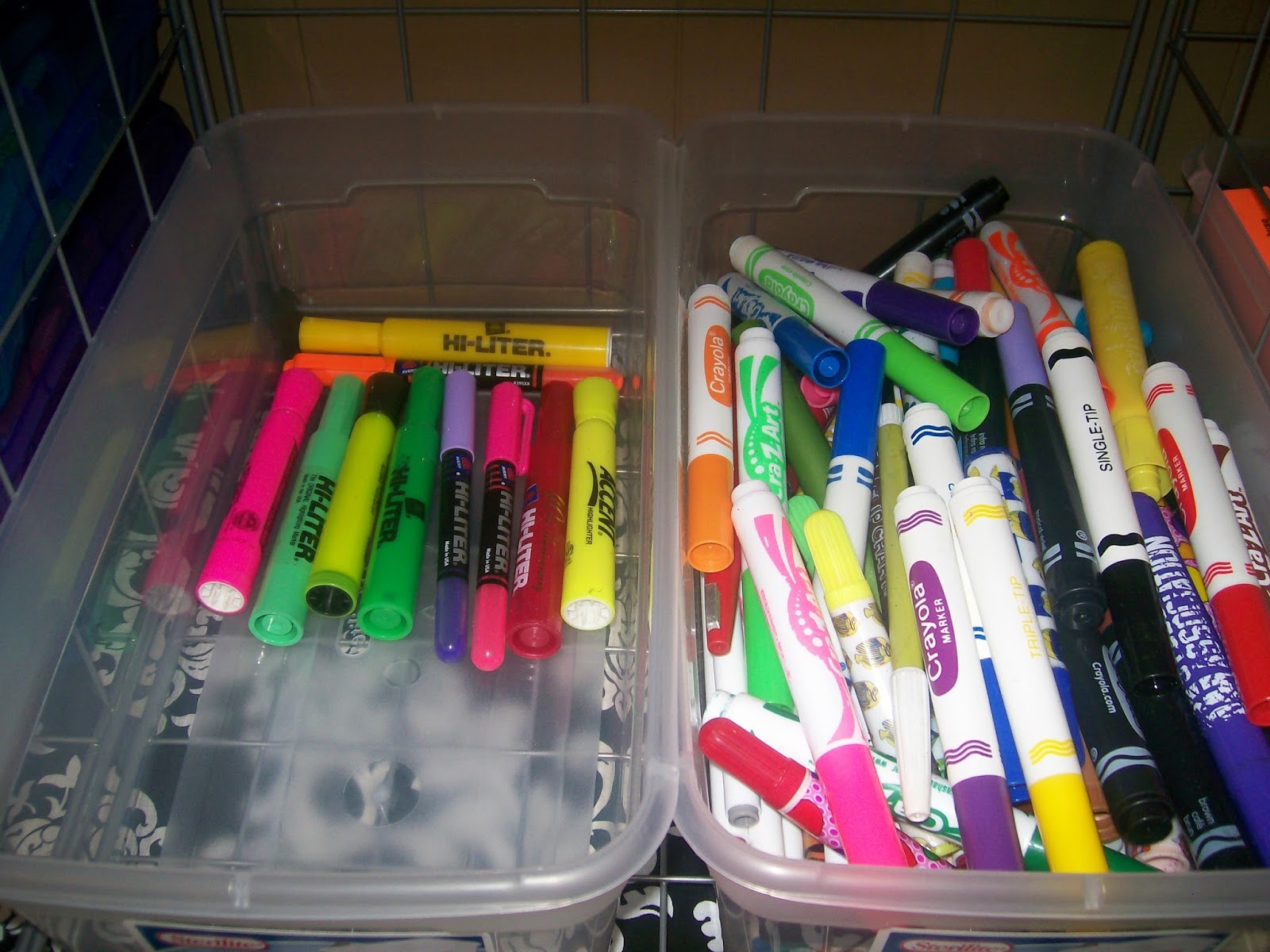 highlighters and markers in tubs. 
