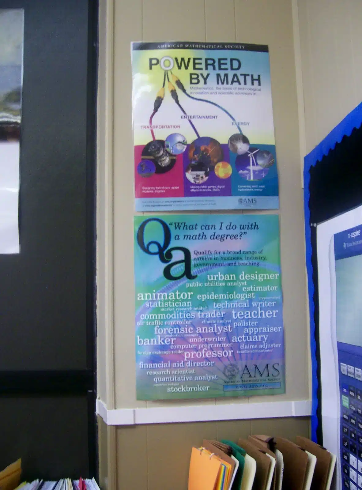 math posters from American mathematical society hanging in high school math classroom. 