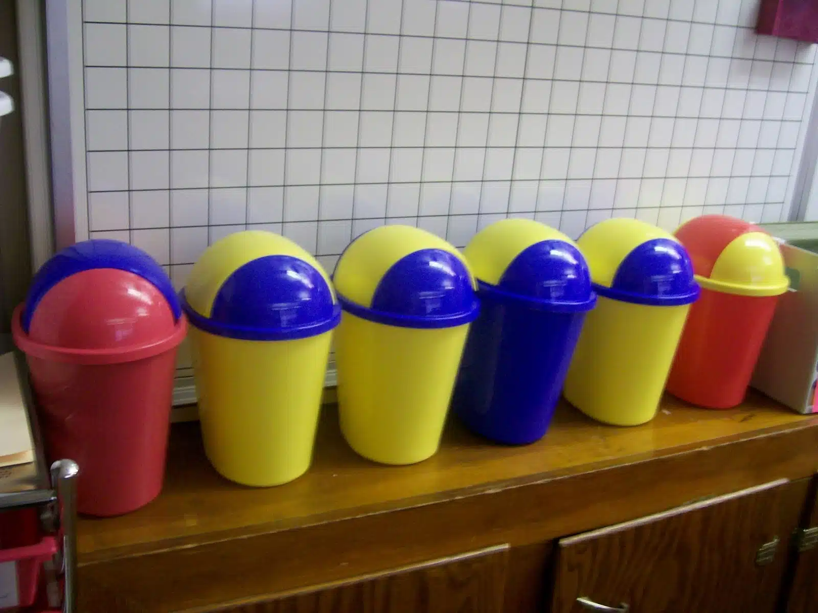 mini trashcans in high school math classroom. 