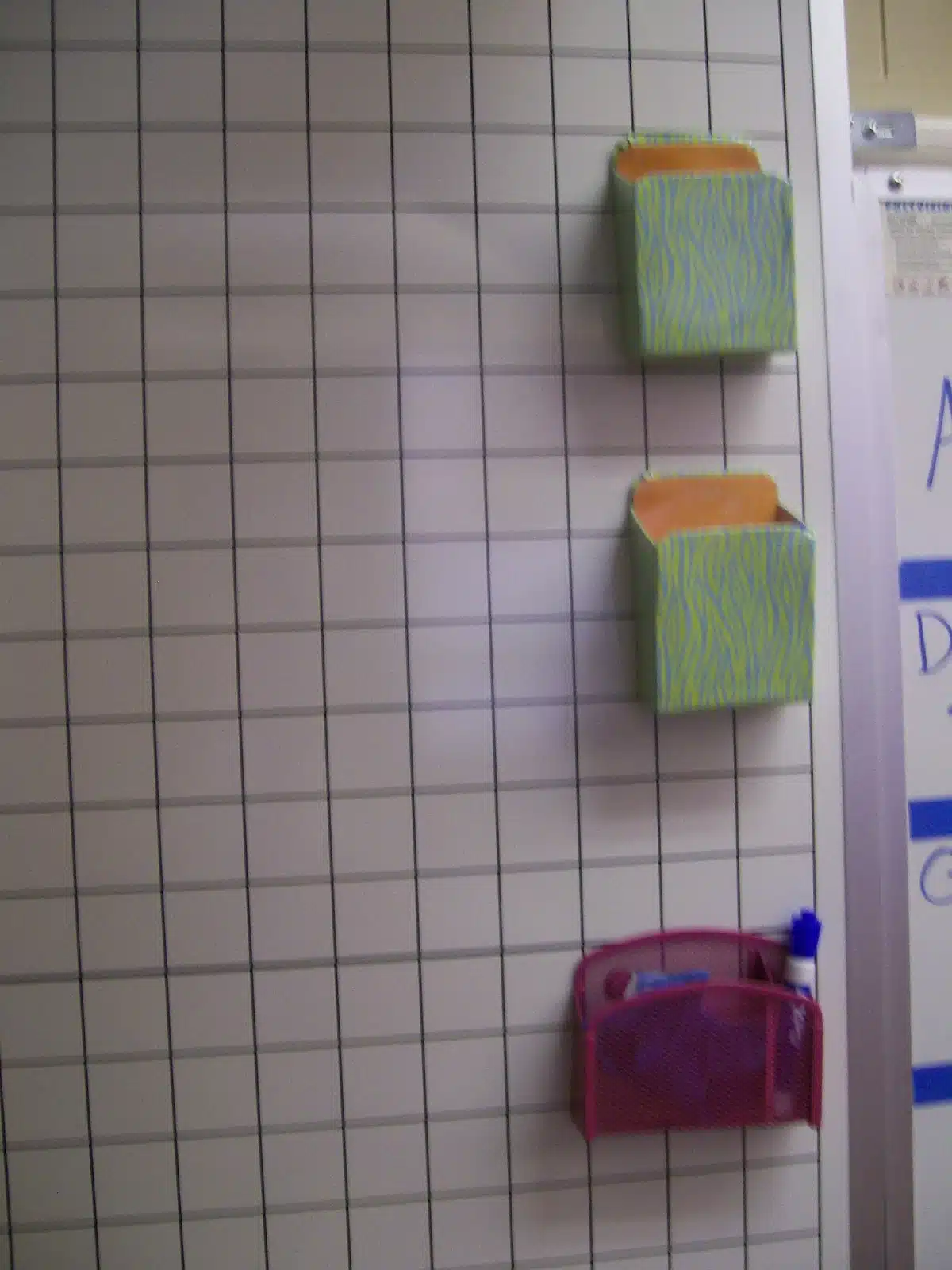 magnetic wall pouches in high school math classroom. 