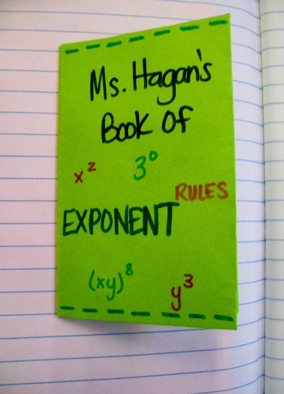 green foldable book with title "Ms. hagan's book of exponent rules." 