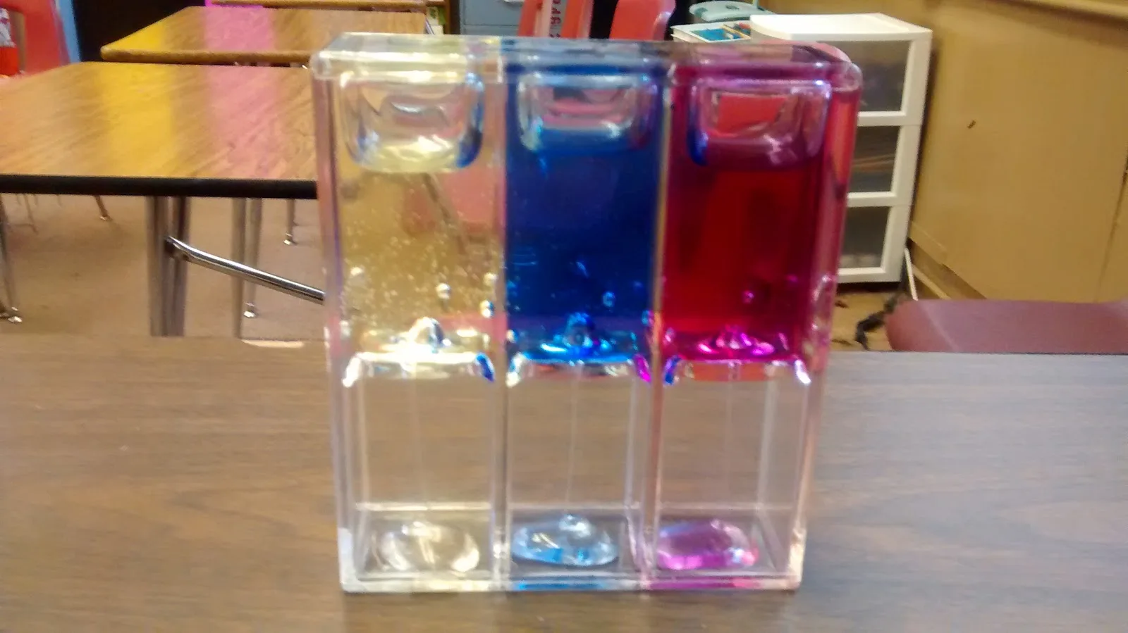 Desk Toy with Liquid that Flows in Three Colors 