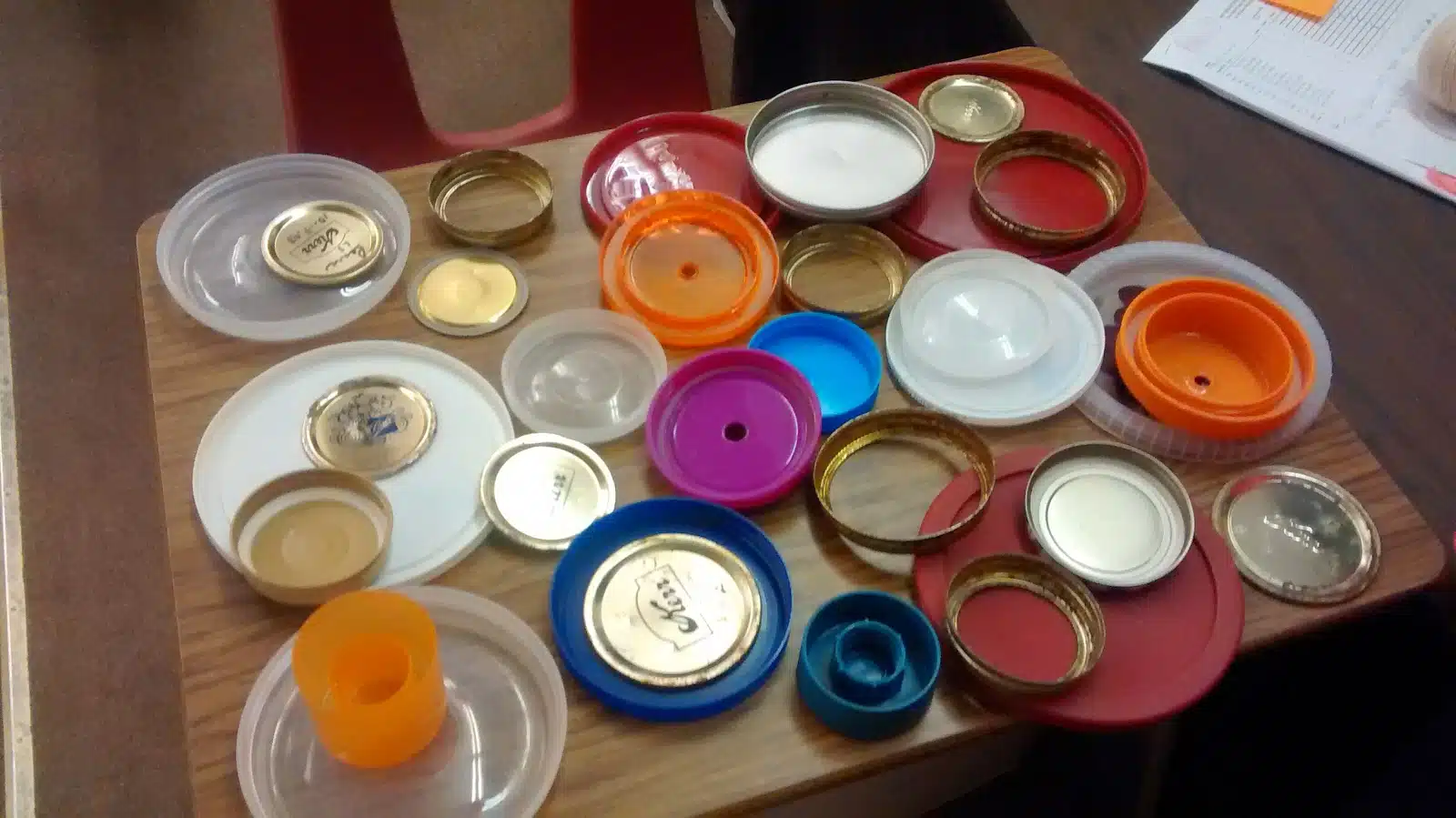 table covered with circular objects for hands-on radian activity. 