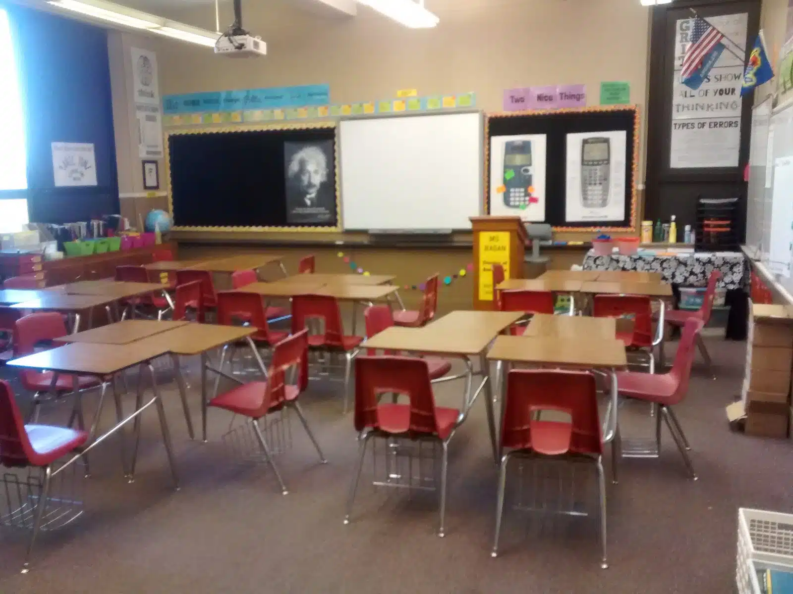 high school math classroom with chairs in groups of 4. 