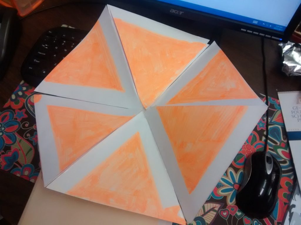 giant hexaflexagon to demonstrate folding. 