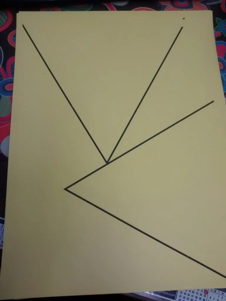 equilateral triangle template on yellow cardstock. 