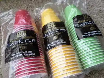 packages of red, yellow, and green cups. 