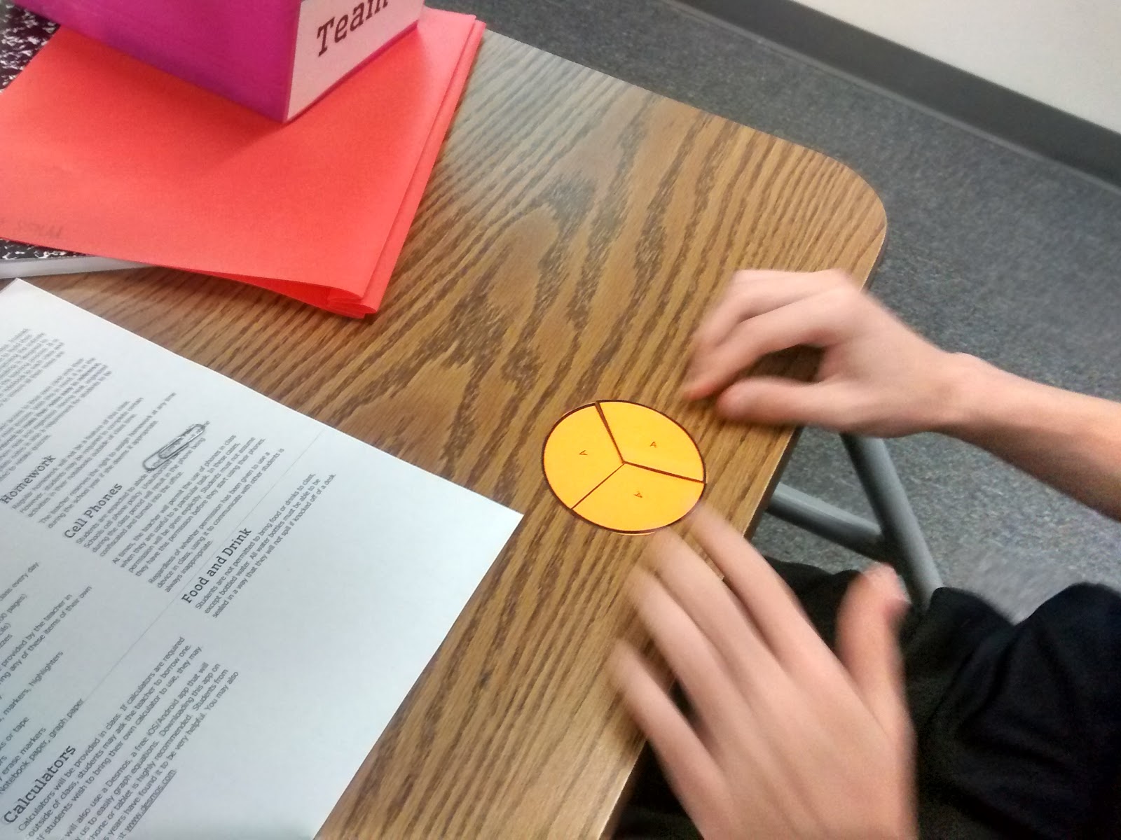 Student working on broken circles activity. 