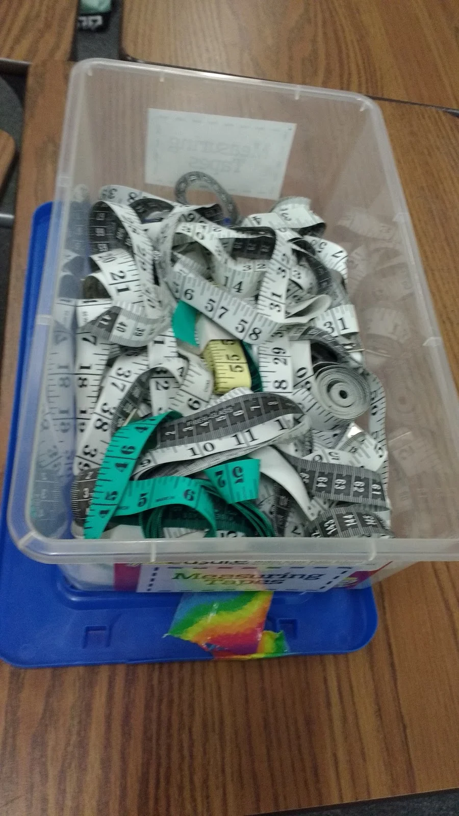 tub of cloth tape measures. 