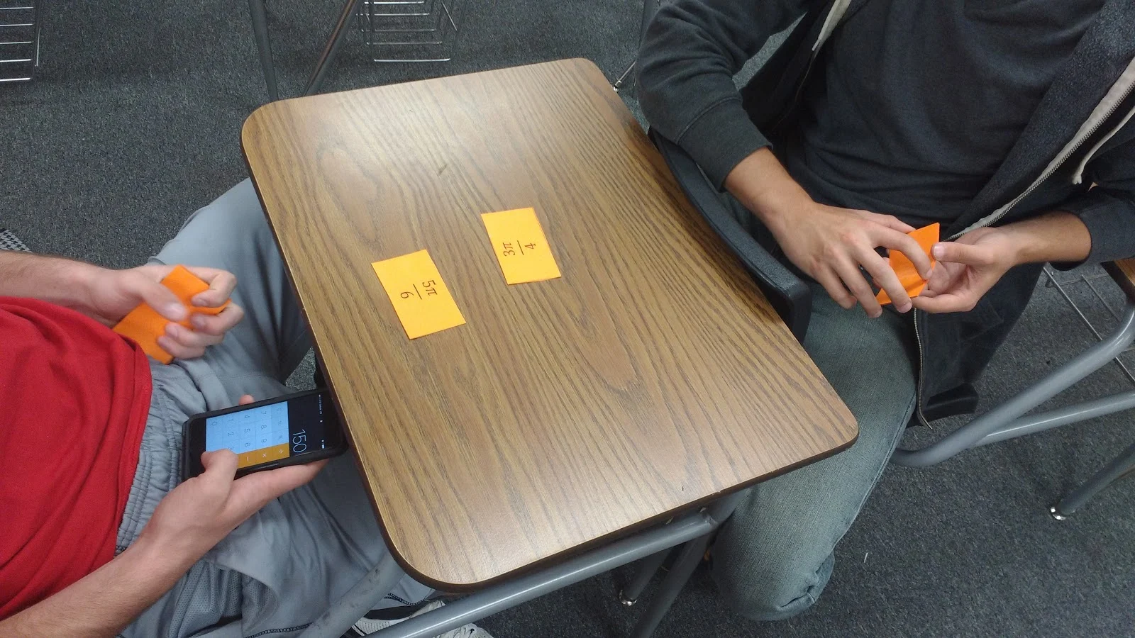 students playing radians degrees war card game. 