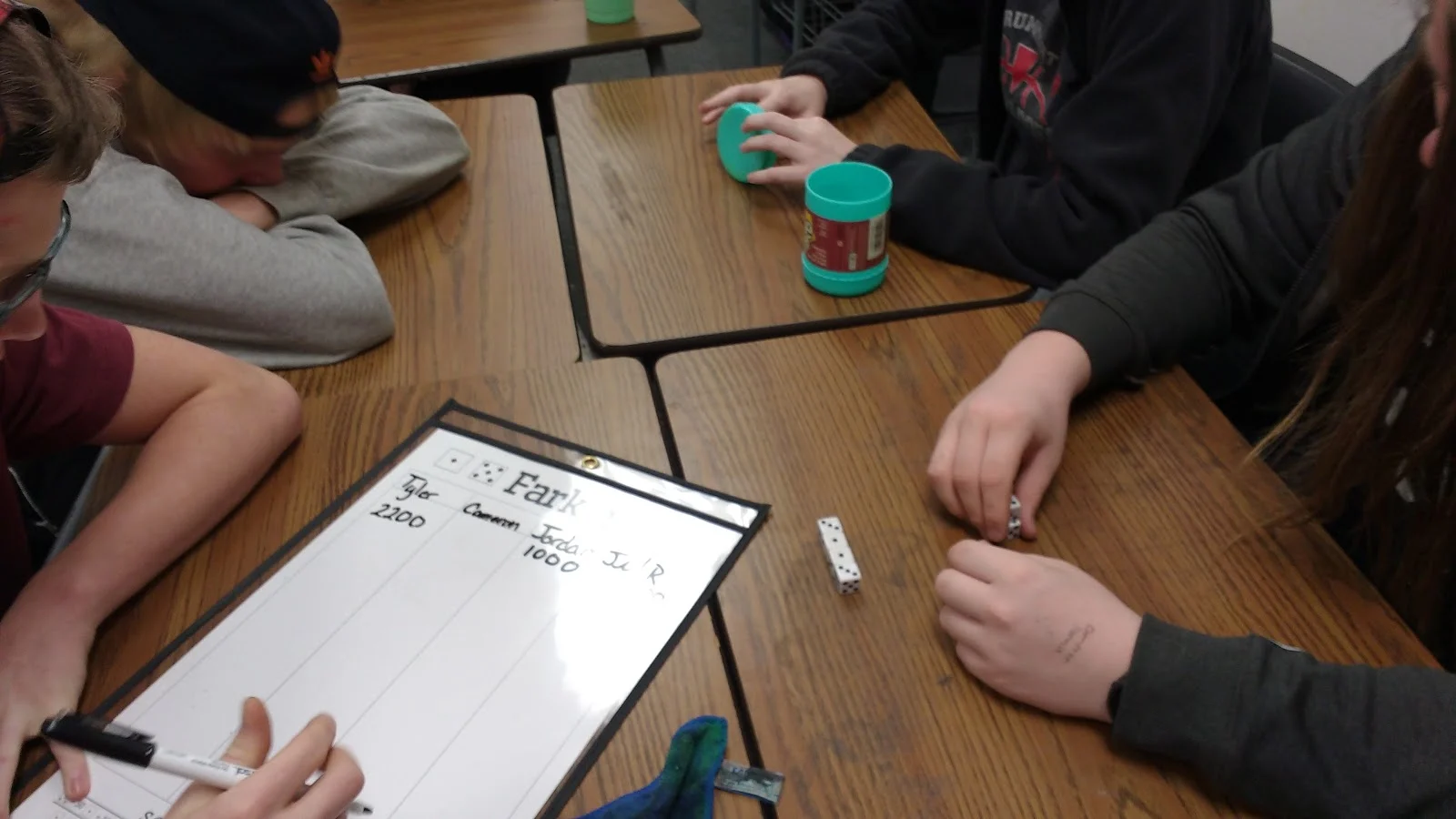 students playing a game of farkle. 