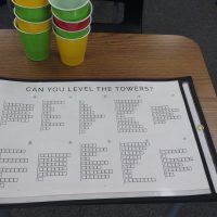 level the towers activity for introducing mean inside of dry erase pocket with text 