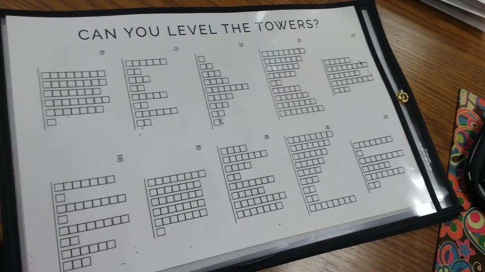 level the towers activity for introducing the concept of mean in dry erase pocket.