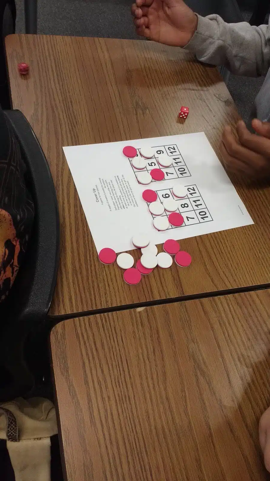 Students Playing Cover Up Game by Frank Tapson 