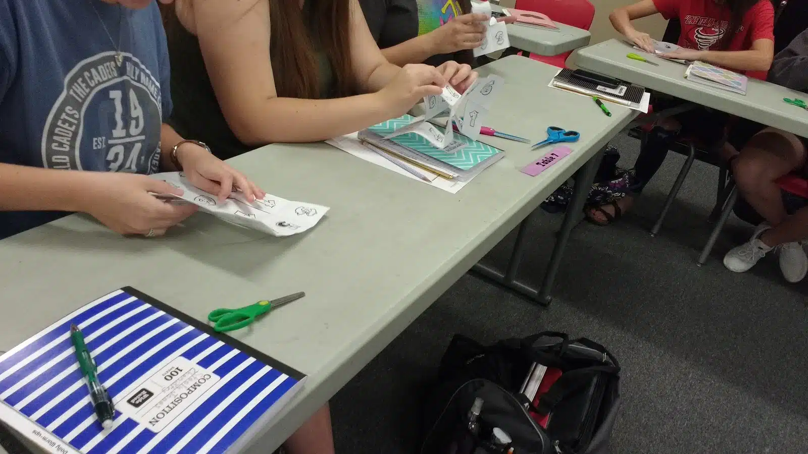 students working on crazy eight puzzle. 