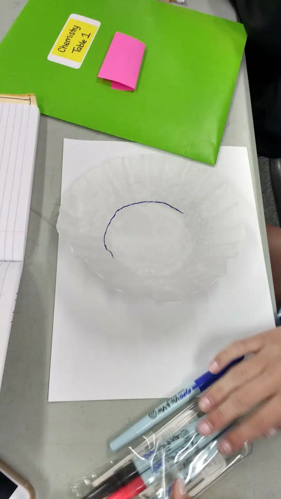 half circle drawn on coffee filter. 