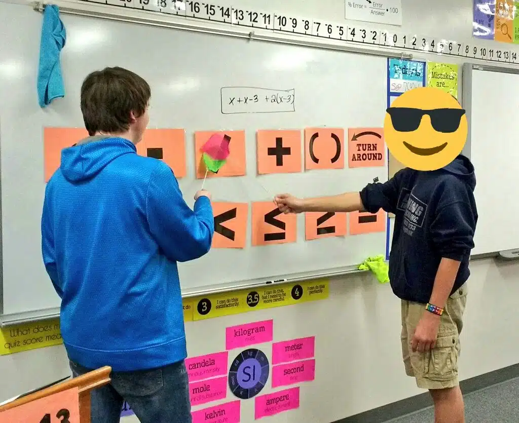 Students playing Translating Algebra Flyswatter Game 