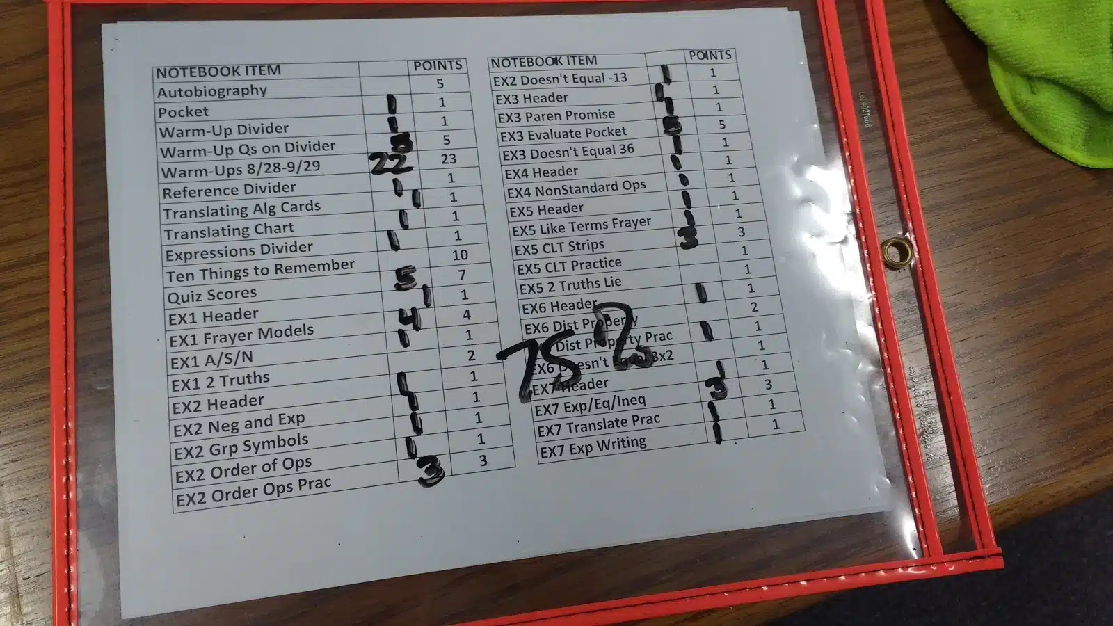 notebook check form inside dry erase pocket