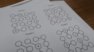 Strimko Logic Puzzles Printed on Piece of Paper.