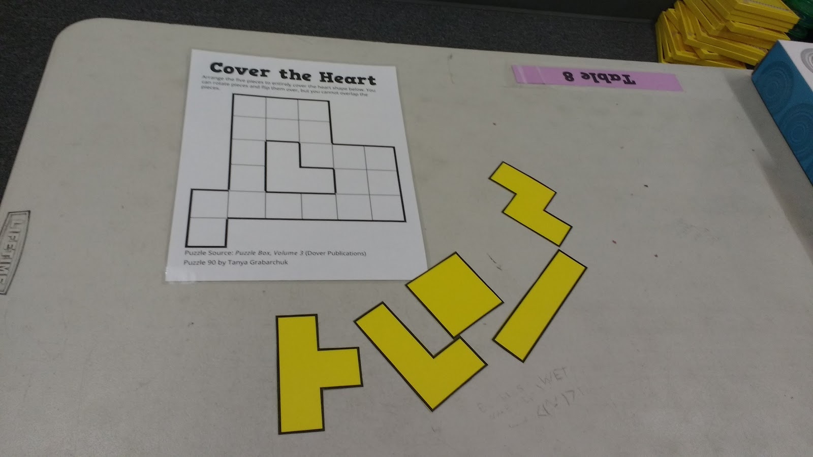Cover the Heart Puzzle on Table in Classroom. 