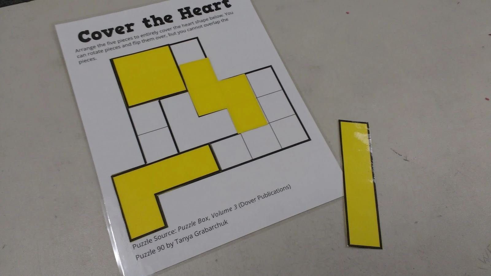 Partially Solved Cover the Heart Puzzle. 
