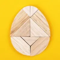 wooden egg of columbus egg tangram puzzle