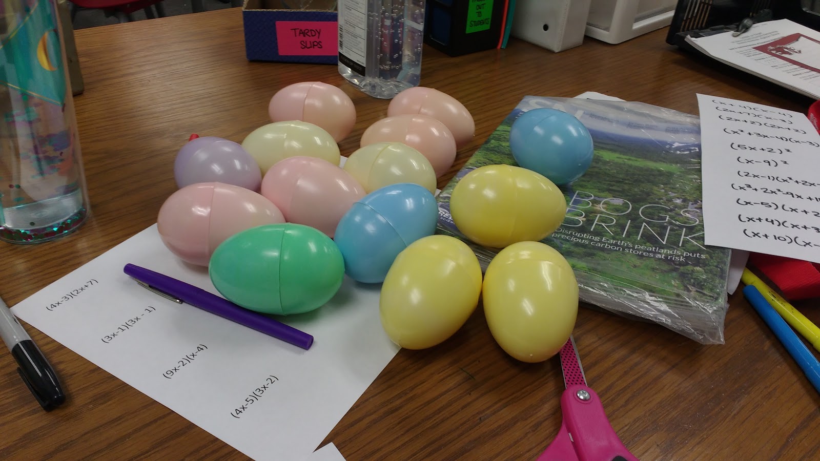 Plastic easter eggs on teacher desk.