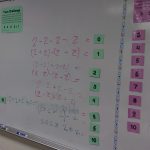 Twos to Nines Challenges on Dry Erase Board.
