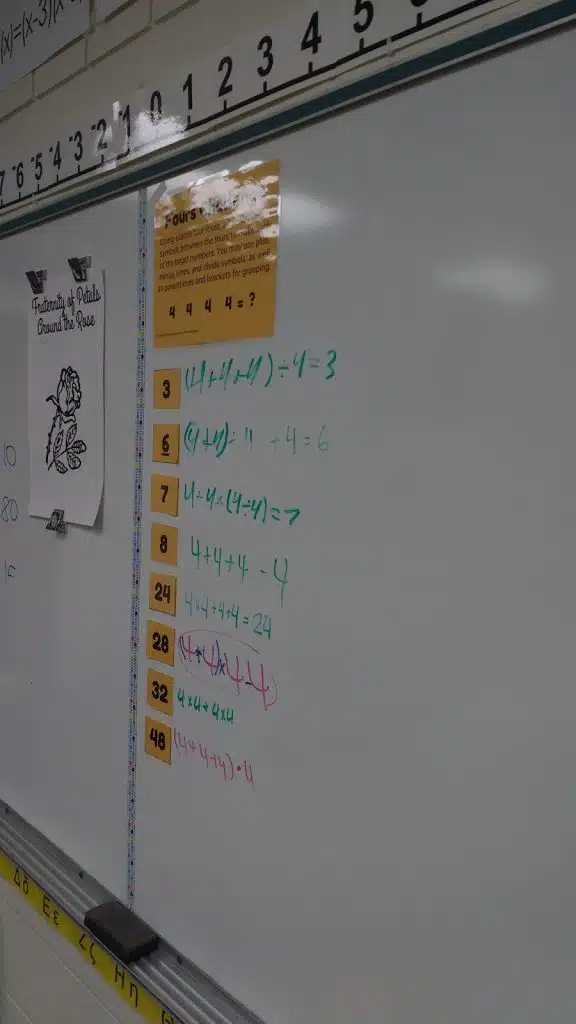 fours challenge on dry erase board 