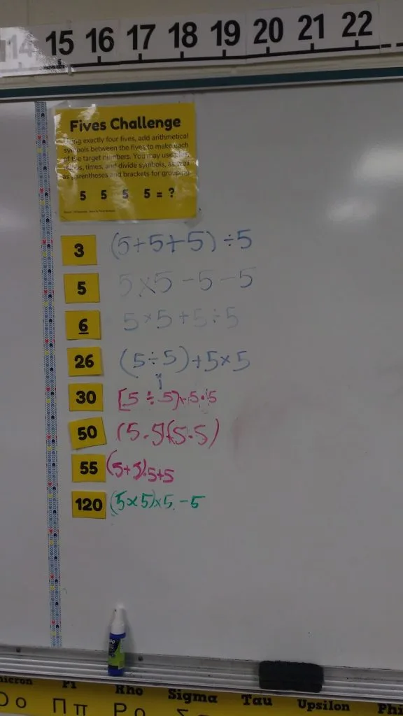 photograph of fives challenge on dry erase board in high school math classroom 