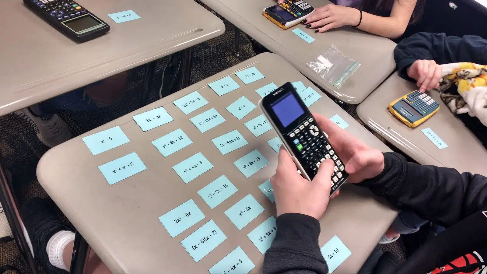 zero game to introduce factoring quadratics. 