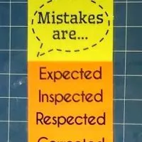Mistakes are Expected, Inspected, Respected, Corrected Poster hanging in high school math classroom.