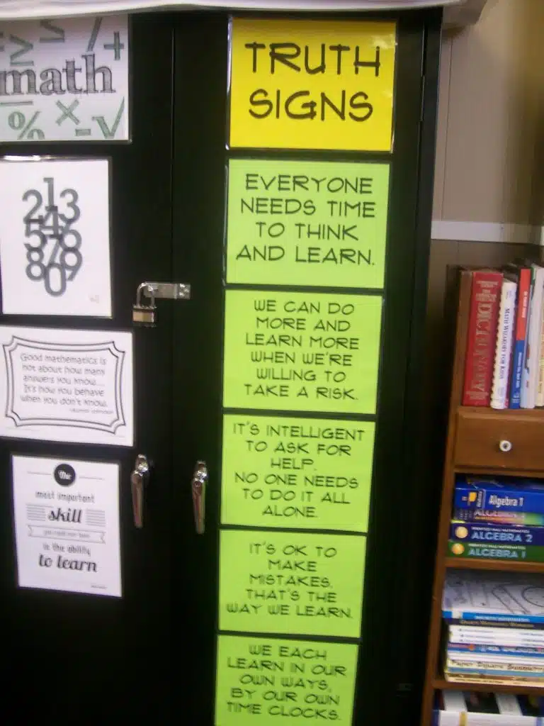 Truth Signs Posters hanging on cabinet in math classroom. 