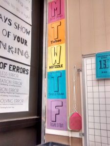 Weekly Warm Up Themed Bellwork Posters in High School Math Classroom.