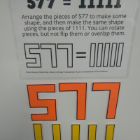 577=11111 Puzzle on Dry Erase Board.