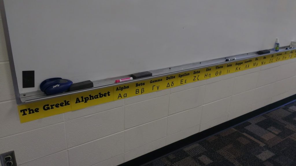 Greek Alphabet Poster Under Dry Erase Board in Math Classroom 