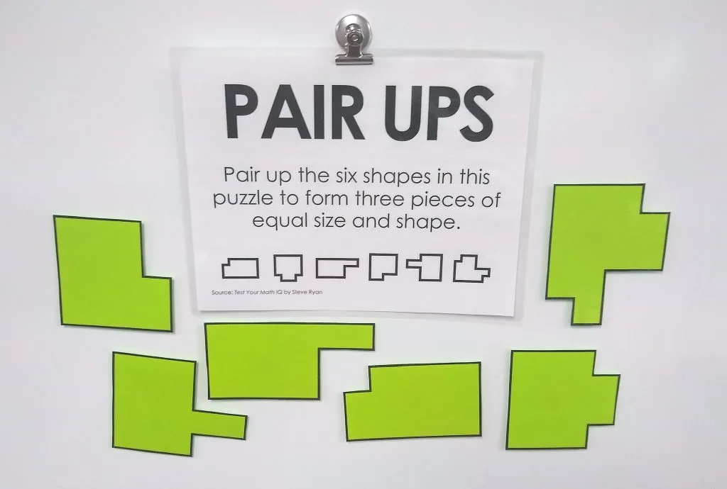 Pair Ups Puzzle Hanging on Dry Erase Board with Magnets. 