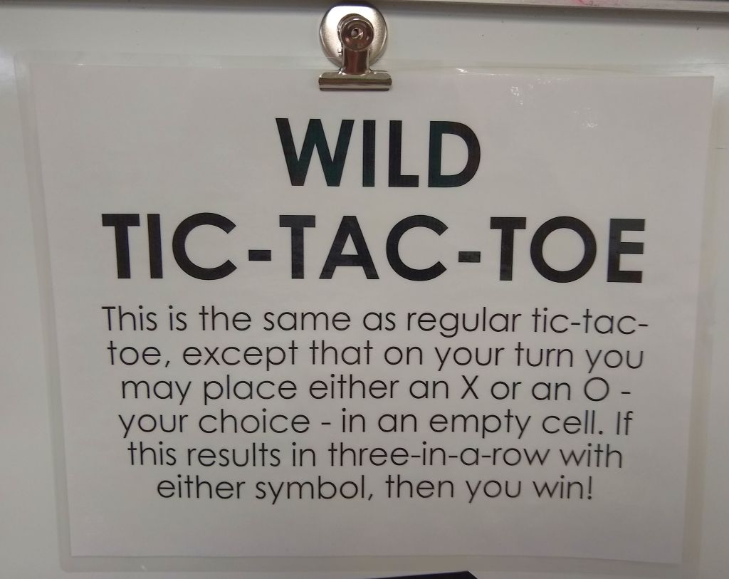 poster with instructions for wild tic tac toe. 