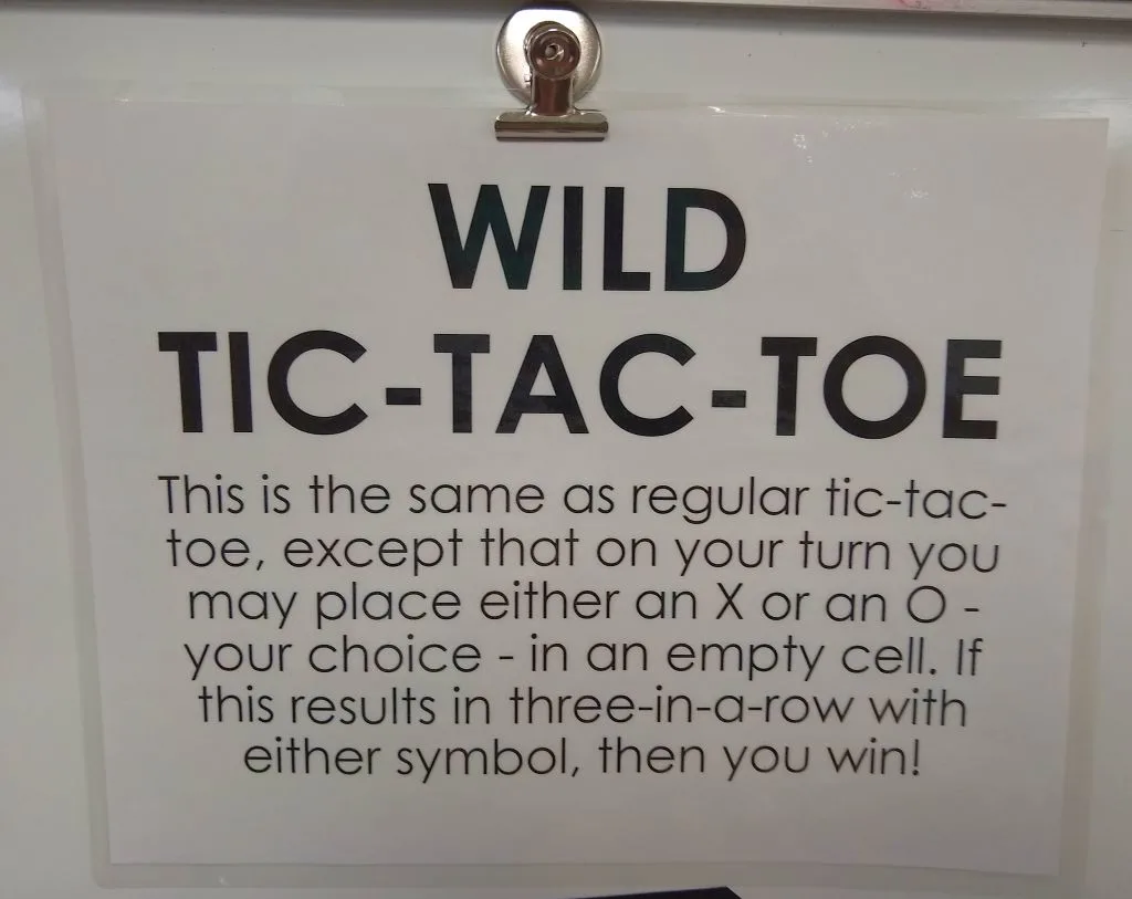 poster with instructions for wild tic tac toe. 