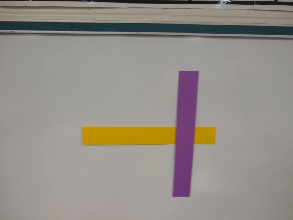 example of sticks crossing in let's make squares activity. 