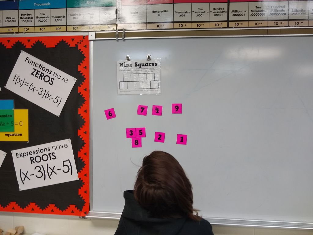 Nine Squares Puzzle on Dry Erase Board. 