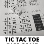 dice on top of tic tac toe dice game board.
