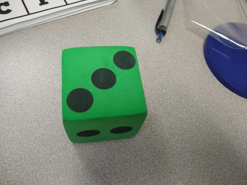 Green Foam Die on Desk 