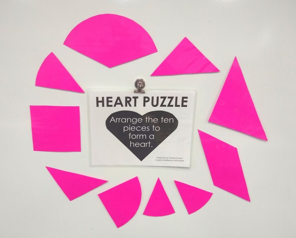 heart tangram puzzle on dry erase board 