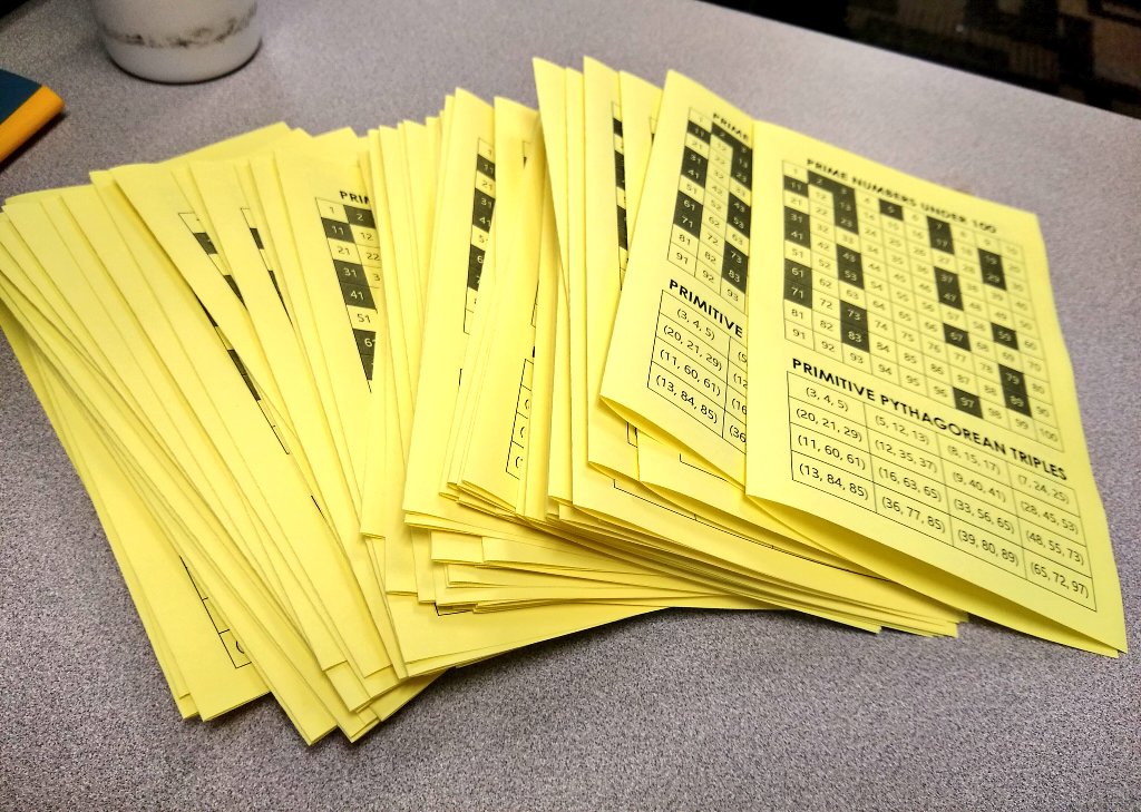 pile of foldable math reference charts.
