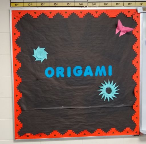 origami bulletin board in high school math classroom. 